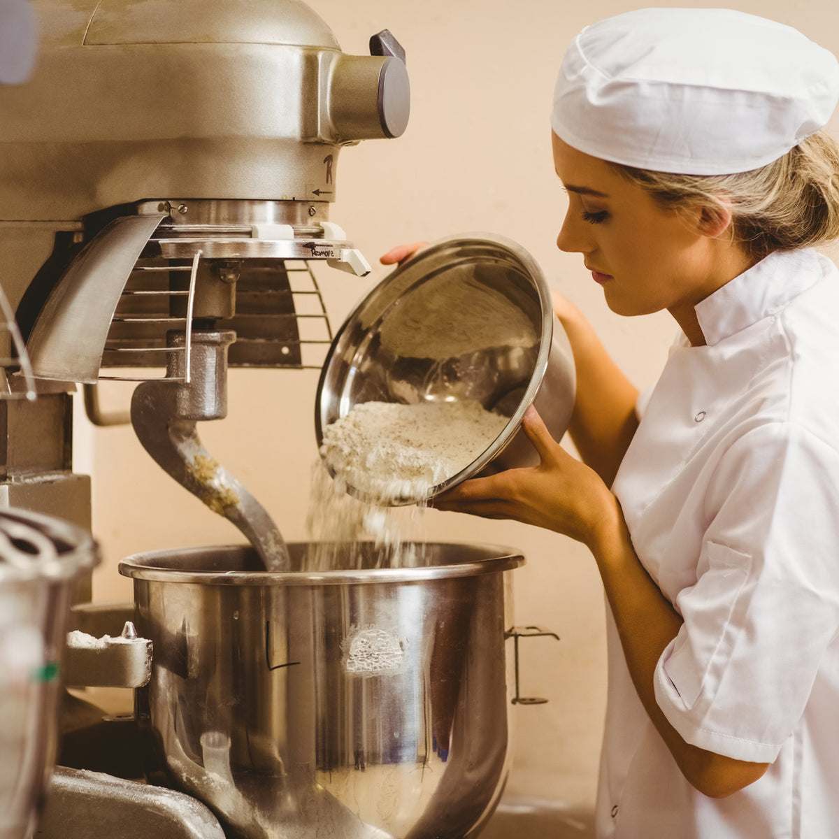 http://www.silverchef.co.nz/cdn/shop/articles/Baker-pouring-flour-into-large-mixer.jpg?crop=center&height=1200&v=1676609371&width=1200